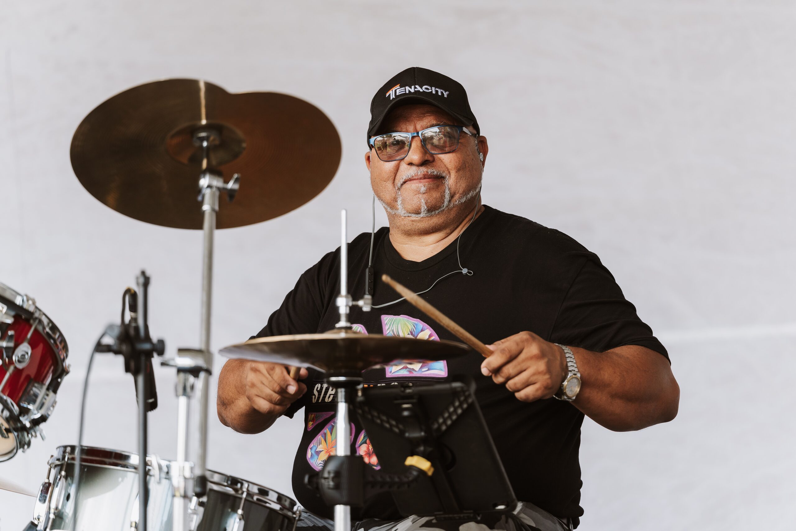 Drummer performing on stage at the Kumeū Show
